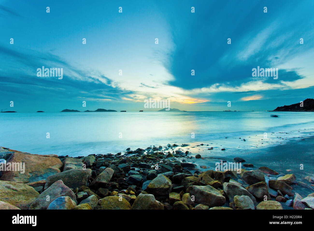Beautiful sunset above the sea along the coast Stock Photo - Alamy