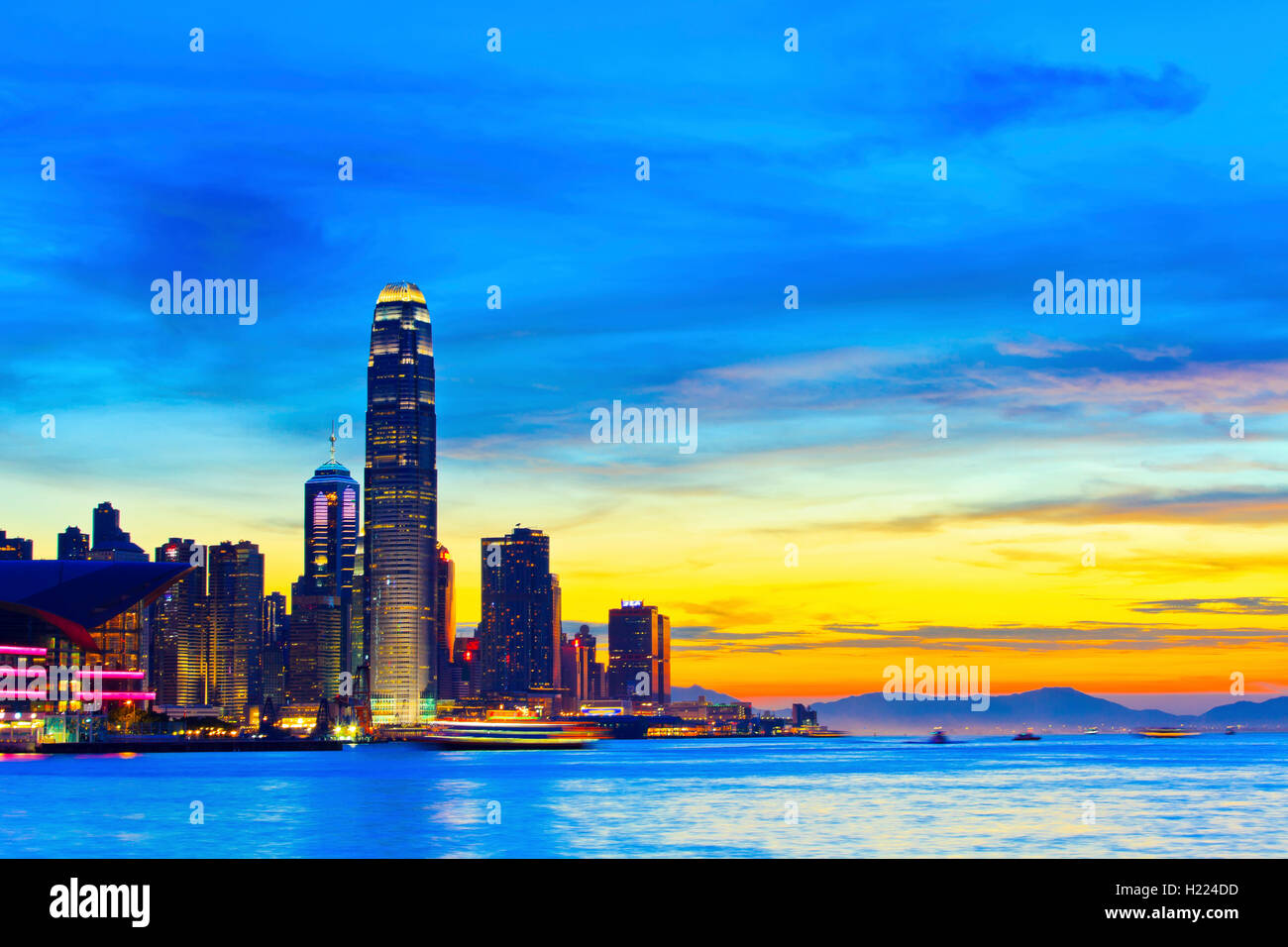 Hong Kong sunset in downtown Stock Photo - Alamy