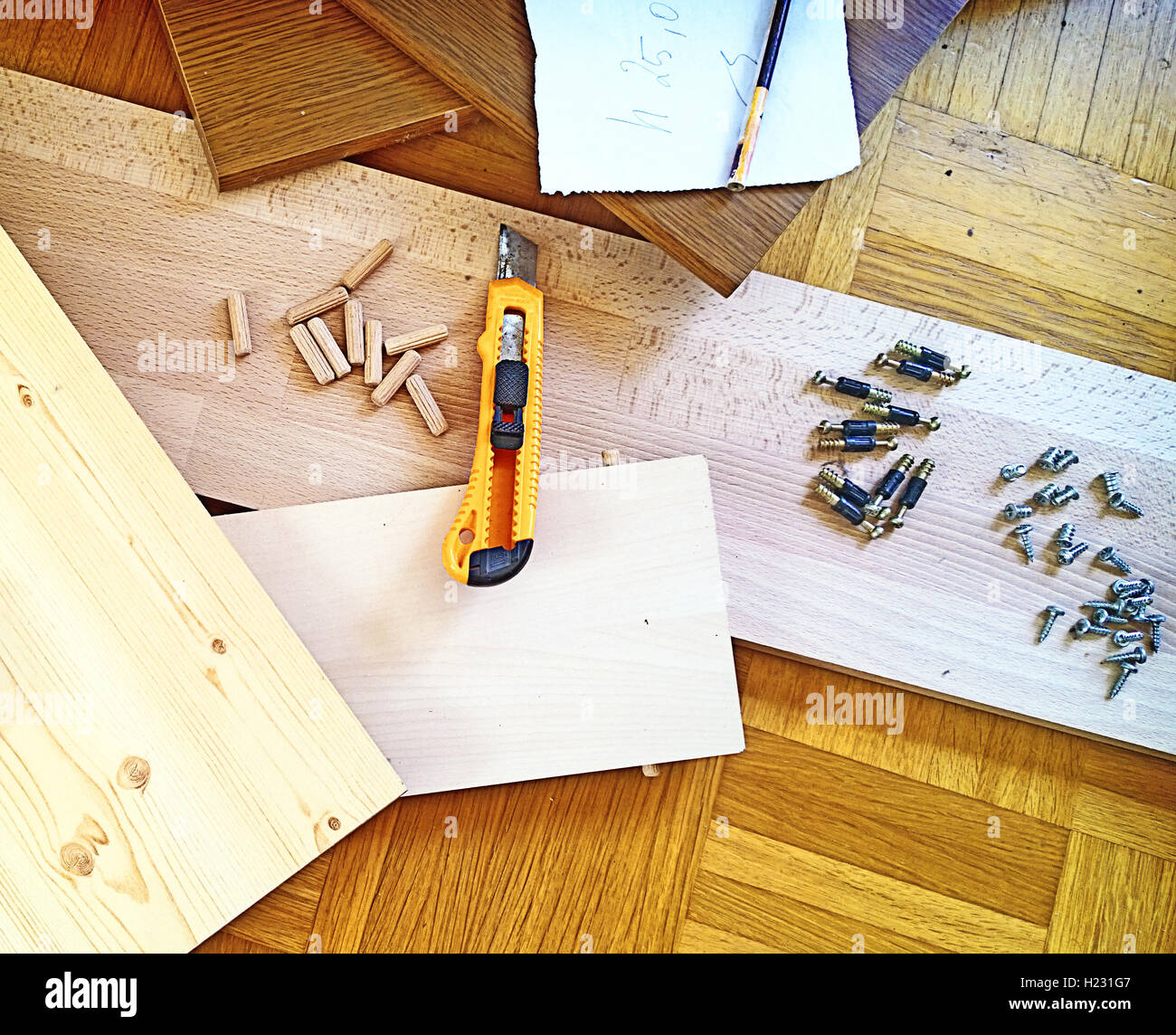 Do-it-yourself at home, repair and renovation, tolls and woods on the floor Stock Photo