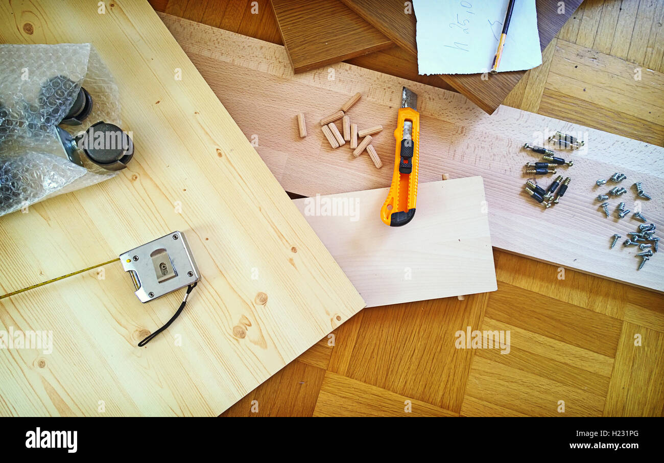 Do-it-yourself at home, repair and renovation, tools and woods on the floor