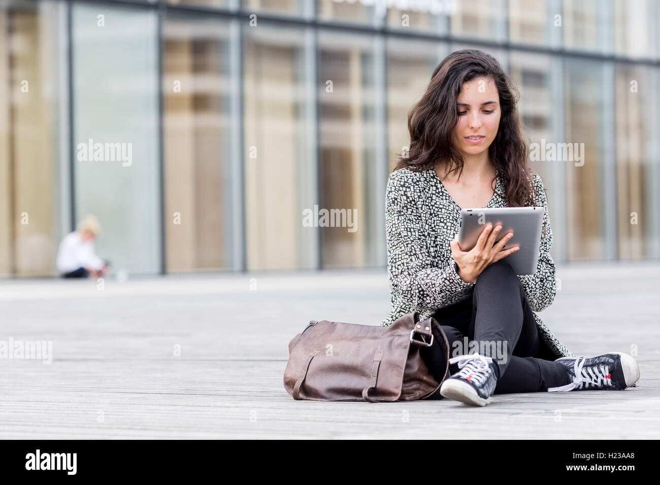Woman using digital tablet. Stock Photo