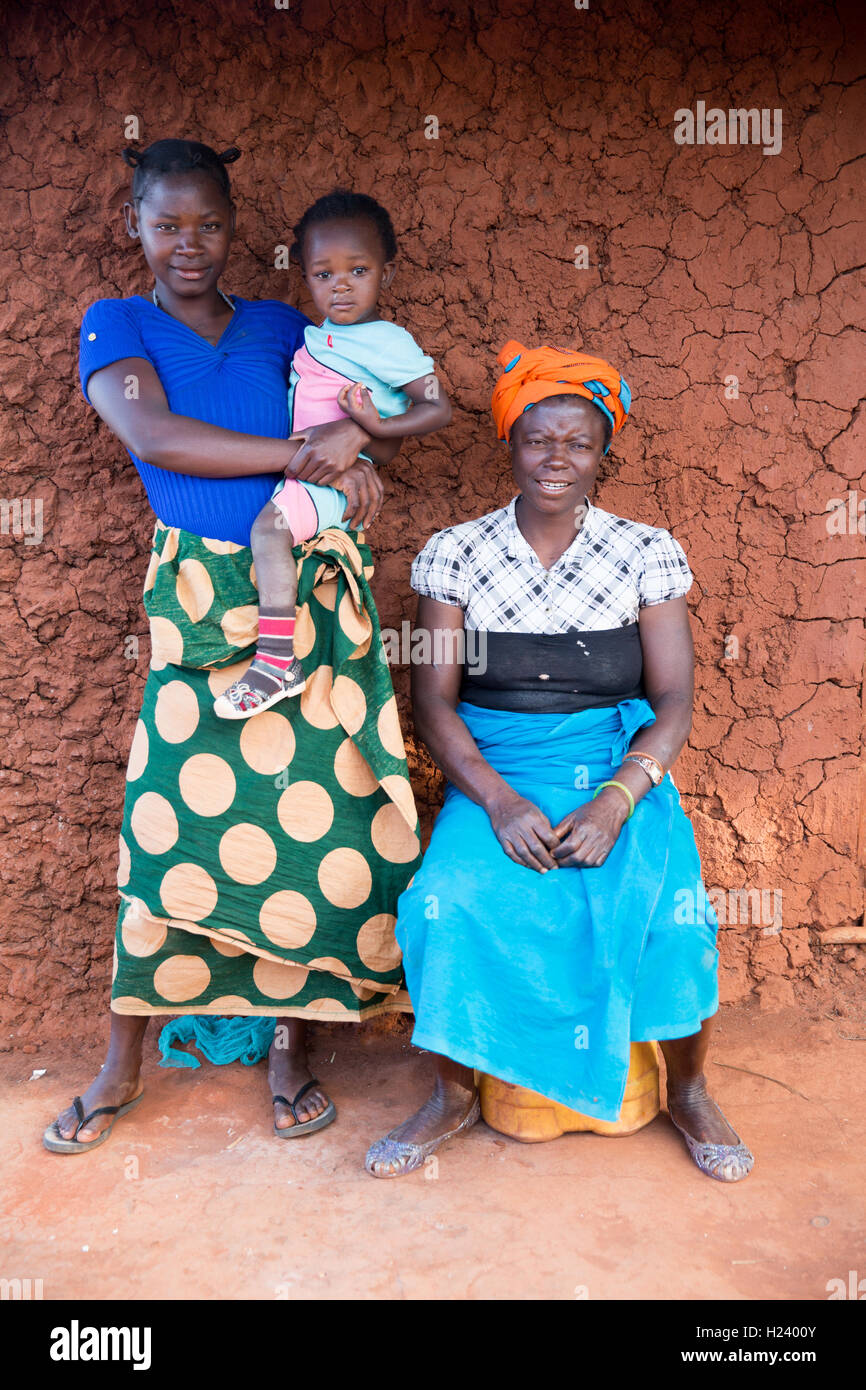 Namina village, Nampula Province, Mozambique, August 2015:  Maria Albino's sister Louisa and Maria's daughter Elsa, 20, are her main carers. Photo by Mike Goldwater Stock Photo