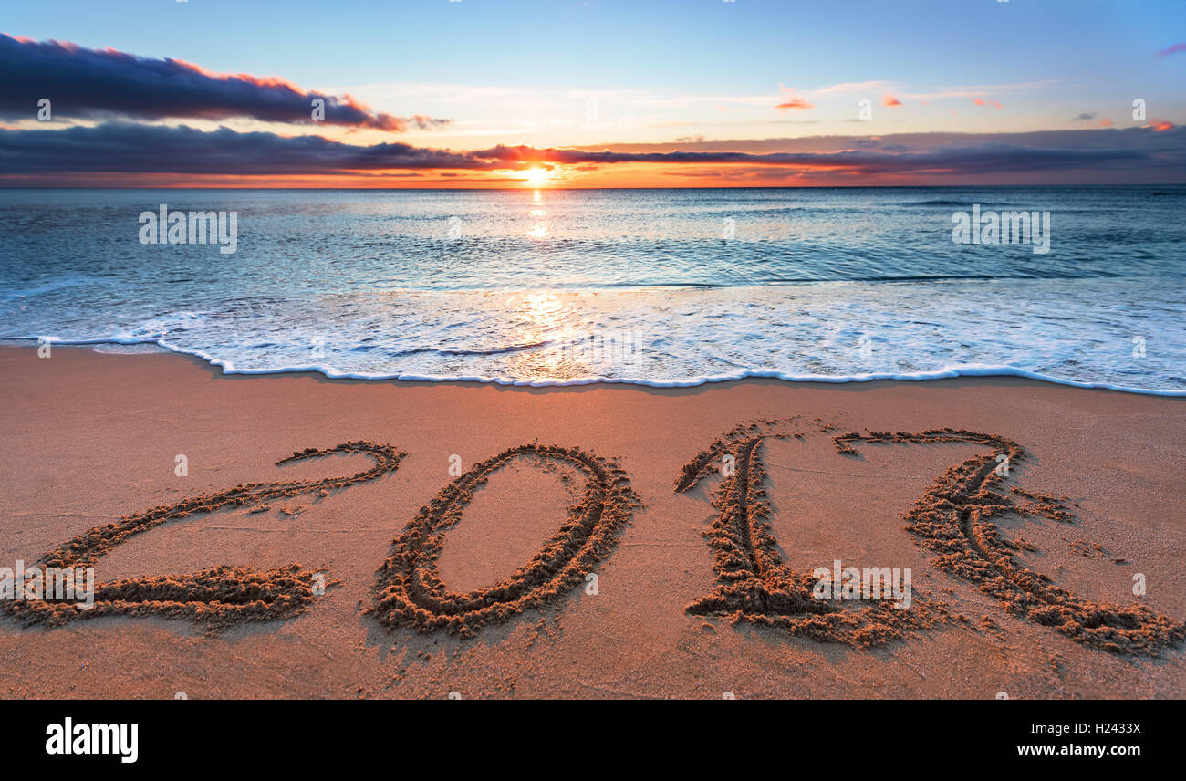 2017 written in sand, on tropical beach Stock Photo