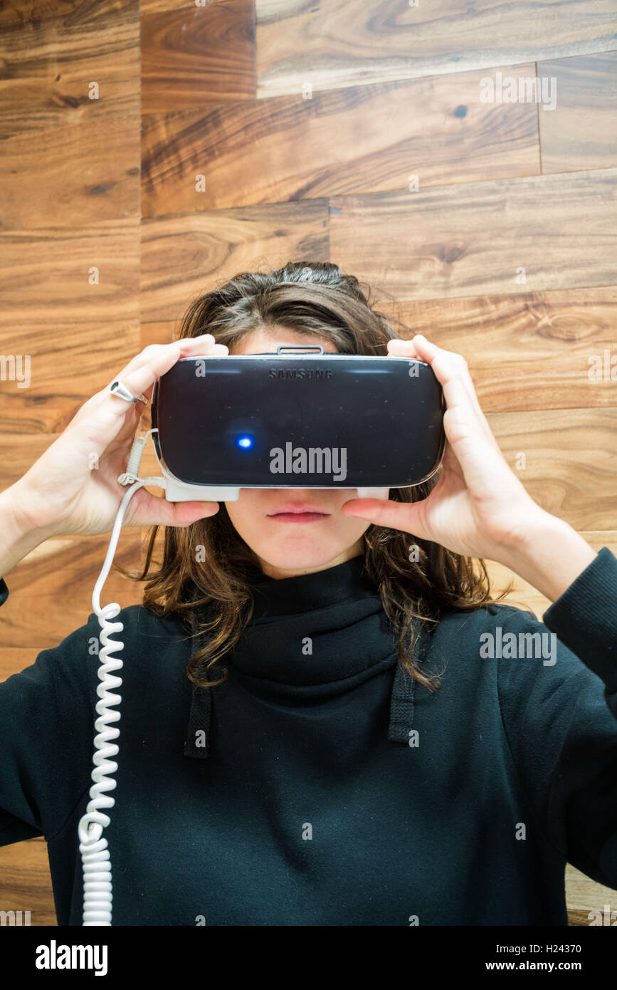 Woman wearing a virtual reality headset Stock Photo - Alamy