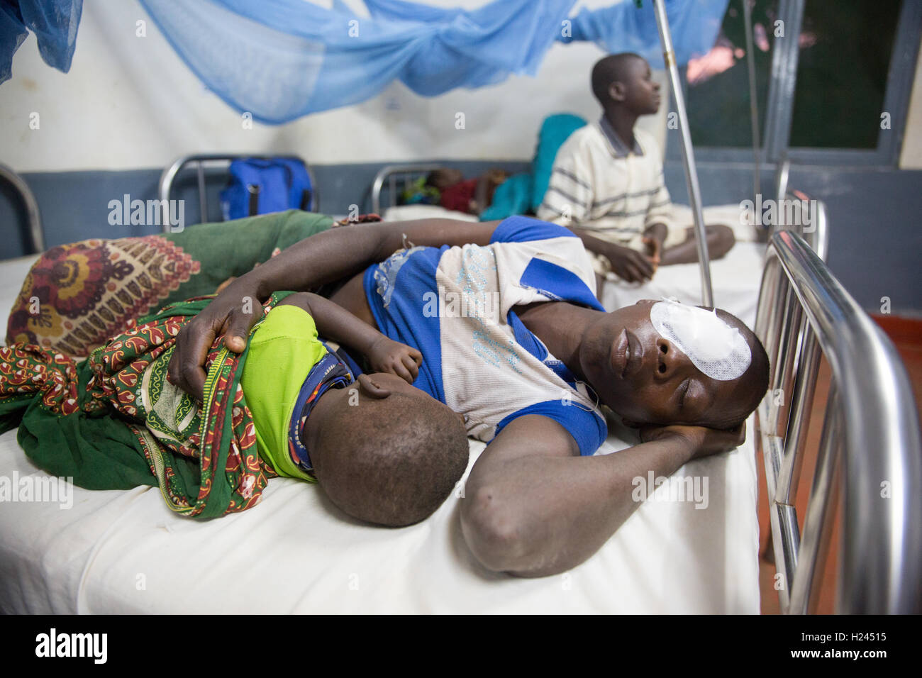 Ribaue Hospital, Ribaue,  Nampula Province, Mozambique, August 2015.  Laurinda Diago resting after her first catarct operation.   Photo by Mike Goldwater Stock Photo