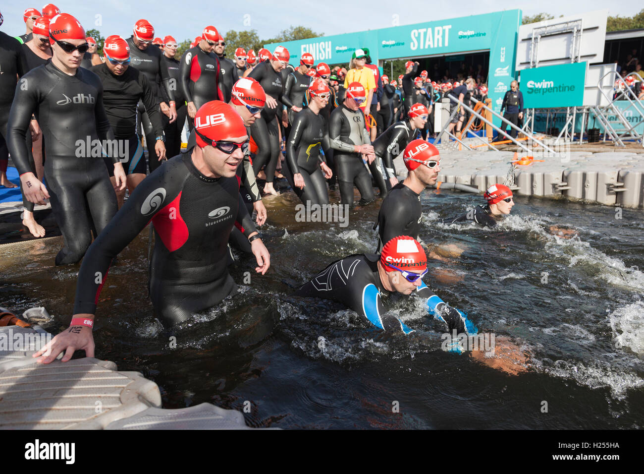 London, UK. 24th Sep, 2016. Thousands of swimmers, most of them in wetsuits, take part in the