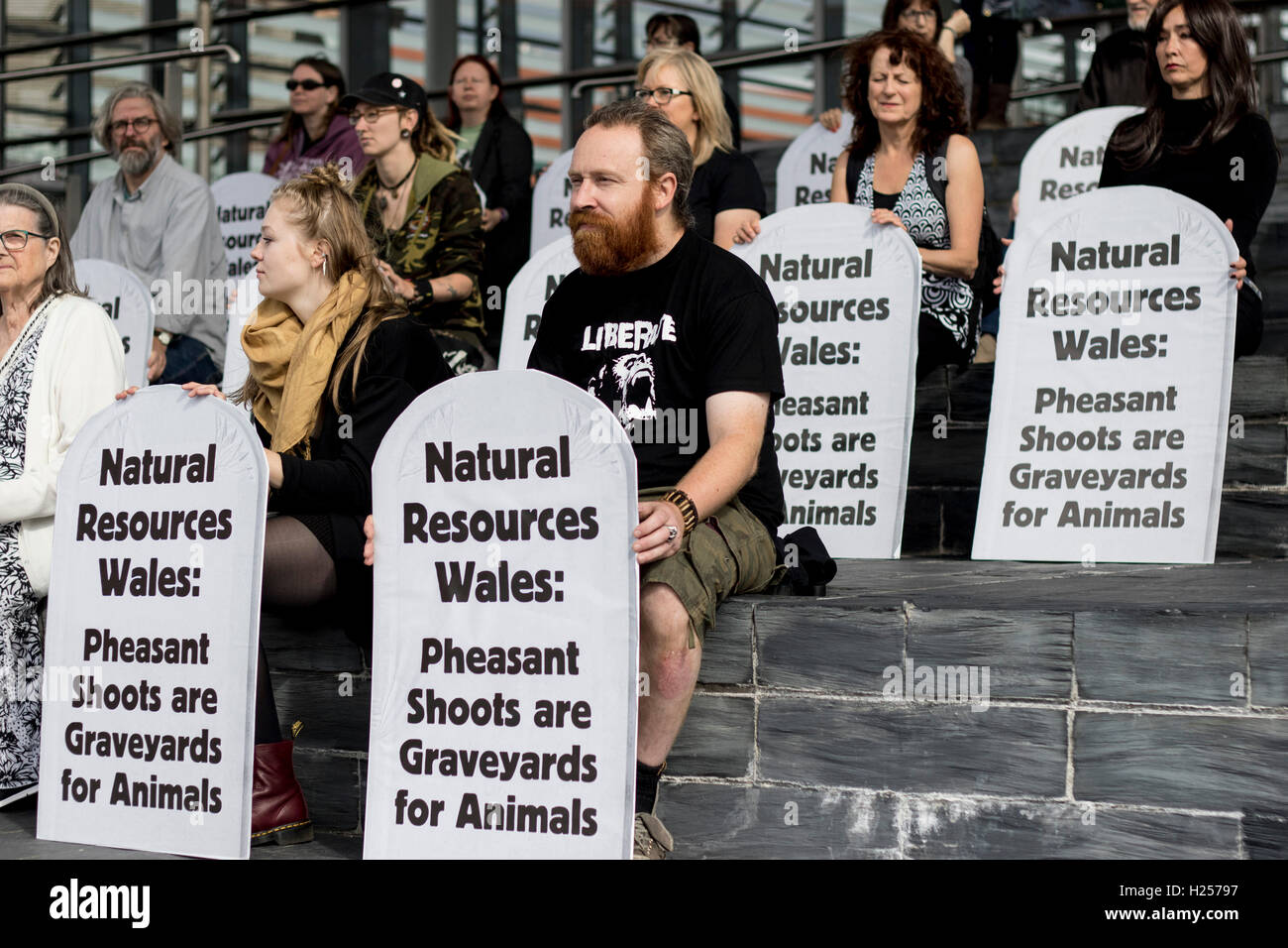Campaigners from animal rights group Animal Aid hold a protest outside the  Senedd (National Assembly for Wales), Cardiff, against government agency  Natural Resources Wales leasing public land for the shooting of pheasants