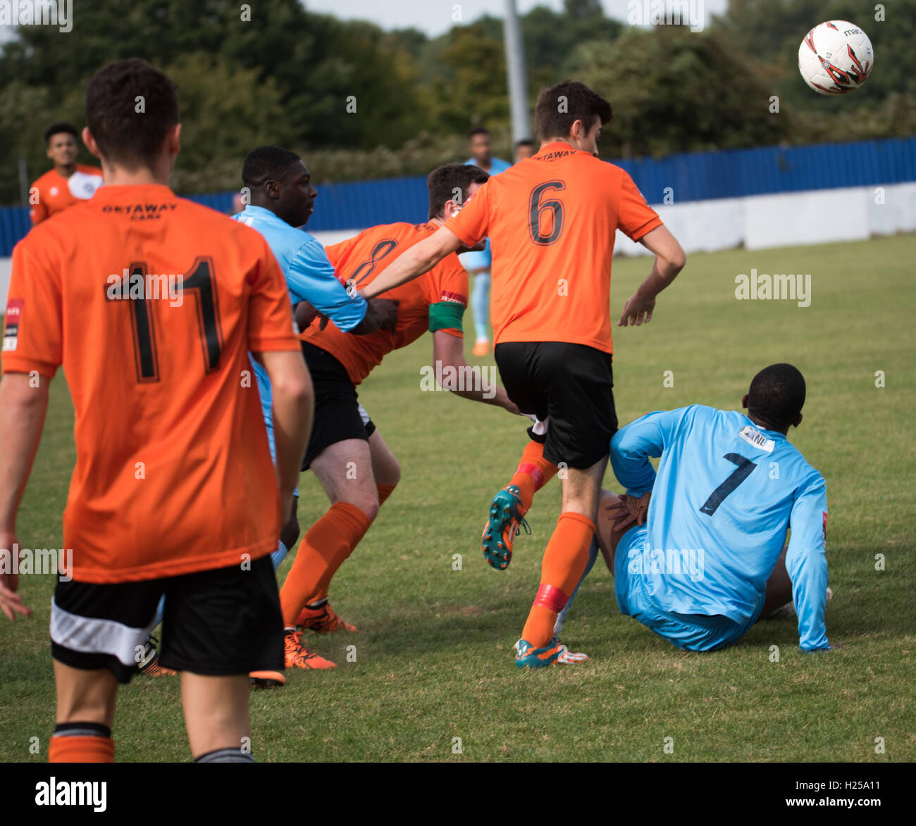 Brentwood, Essex, UK. 24th September, 2016. Brentwood, Essex, Brentwood Twon FC vs Bury Town FC,,Marcus Milner (7) of Brentwood and Remi Garrett of Bury (6 in orange) clash) during the Brentwood FC Vs Bury Town FC match won by Bury FC. Credit:  Ian Davidson/Alamy Live News Stock Photo