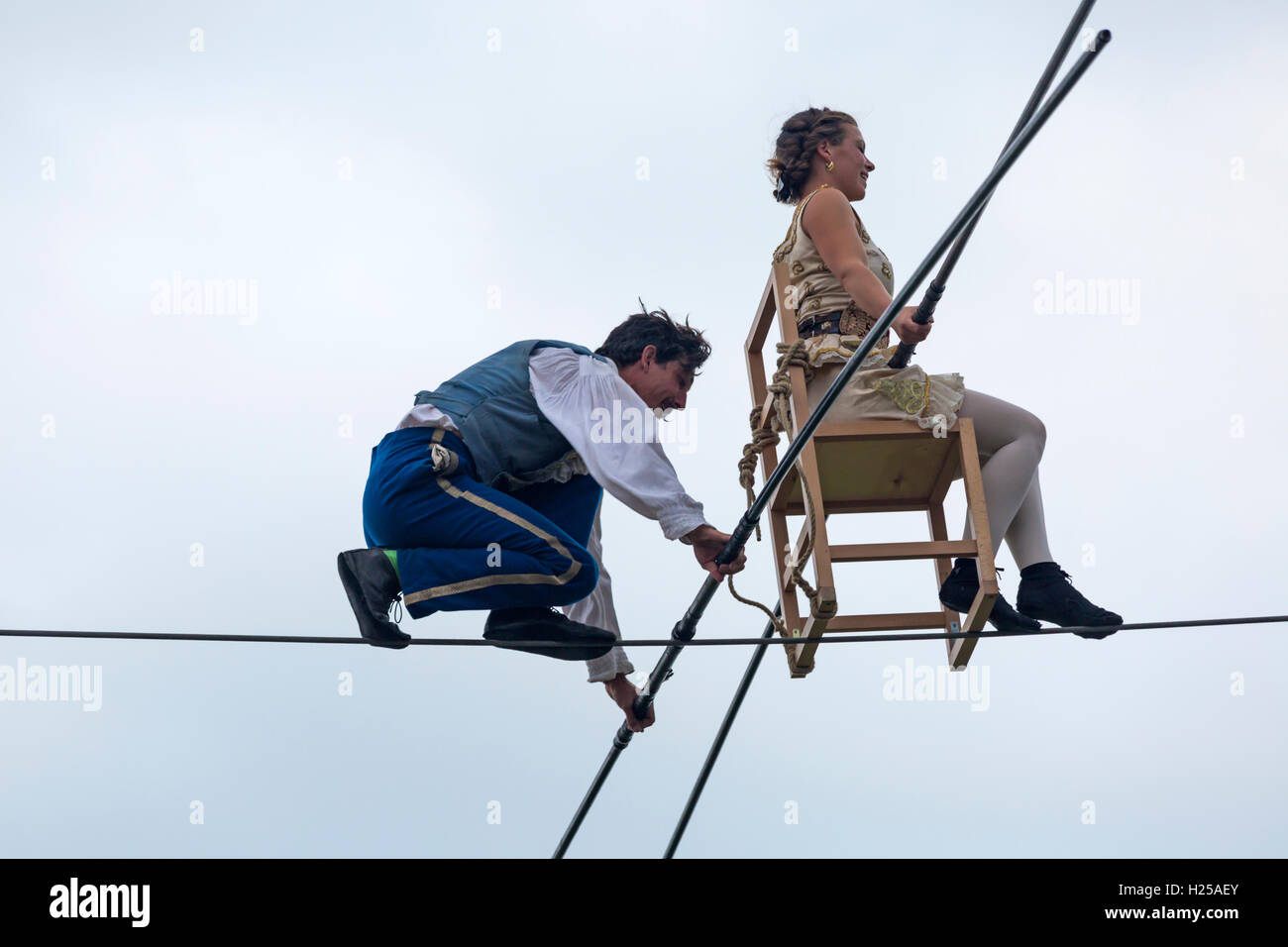 Harbourside, Baiter Park, Poole, Dorset, UK. 24th Sep, 2016. Up in the Air, part of the Inside Out project, sees various artists presenting crowds with an outdoor contemporary circus performance and music against a dramatic background of sea and sky - the Bullzini family thrill the crowds with Equilibrius highwire feats performed on a 10m walking wire 8 metres from the ground. Credit:  Carolyn Jenkins/Alamy Live News Stock Photo