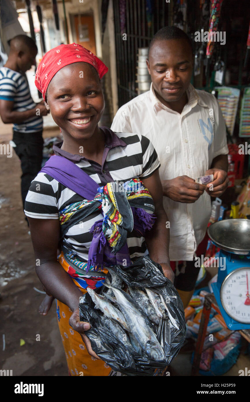 Ribaue Hospital, Ribaue,  Nampula Province, Mozambique, August 2015:  Laurinda Diago's eldest daughter Aide Victorino goes to the market to buy food for her and her mother.   Photo by Mike Goldwater Stock Photo