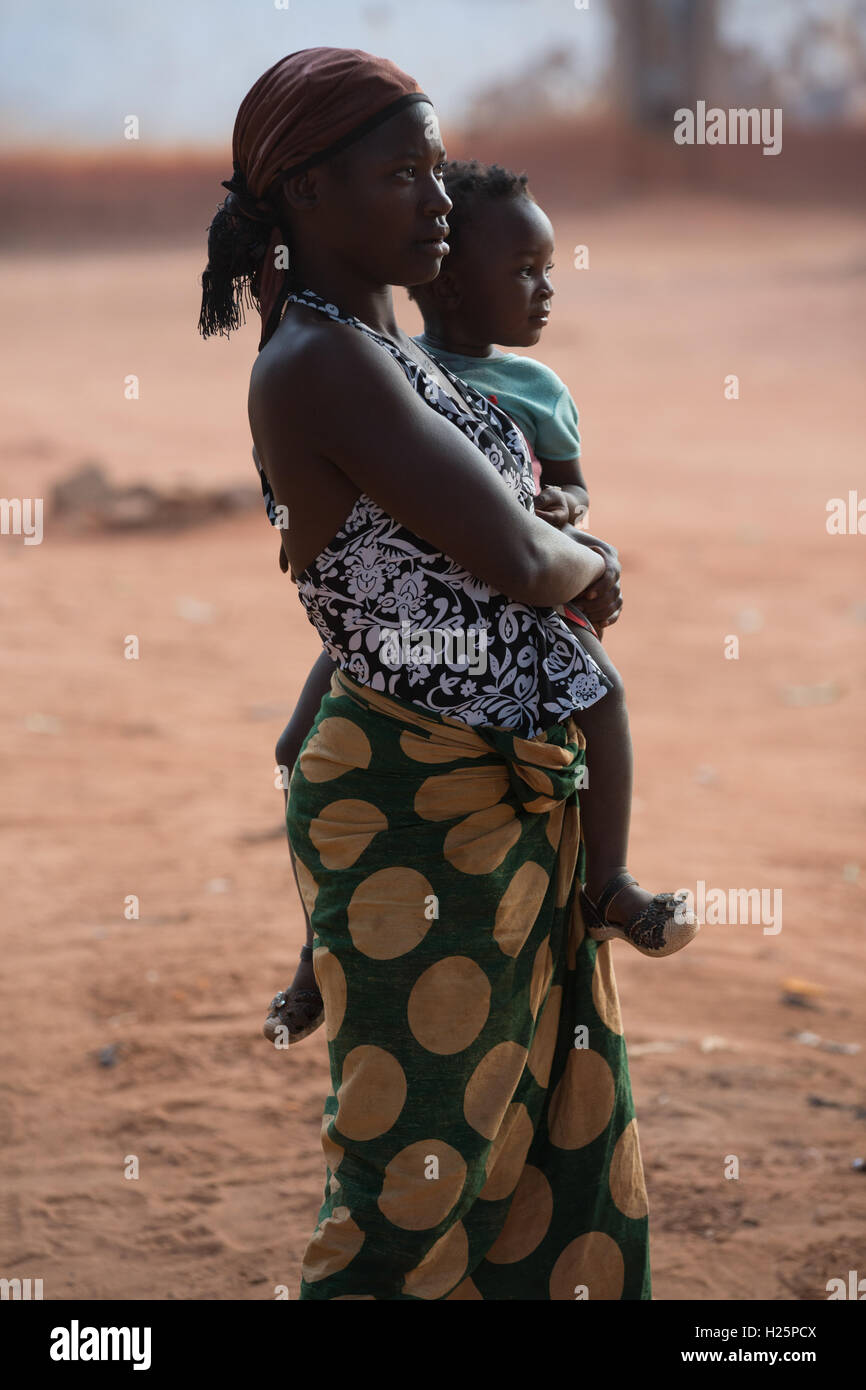 Ribaue Hospital, Ribaue,  Nampula Province, Mozambique, August 2015:  Maria Albino's daughter Elsa prepares to go shopping for food for her, her mother and her daughter Chinesa.      Photo by Mike Goldwater Stock Photo