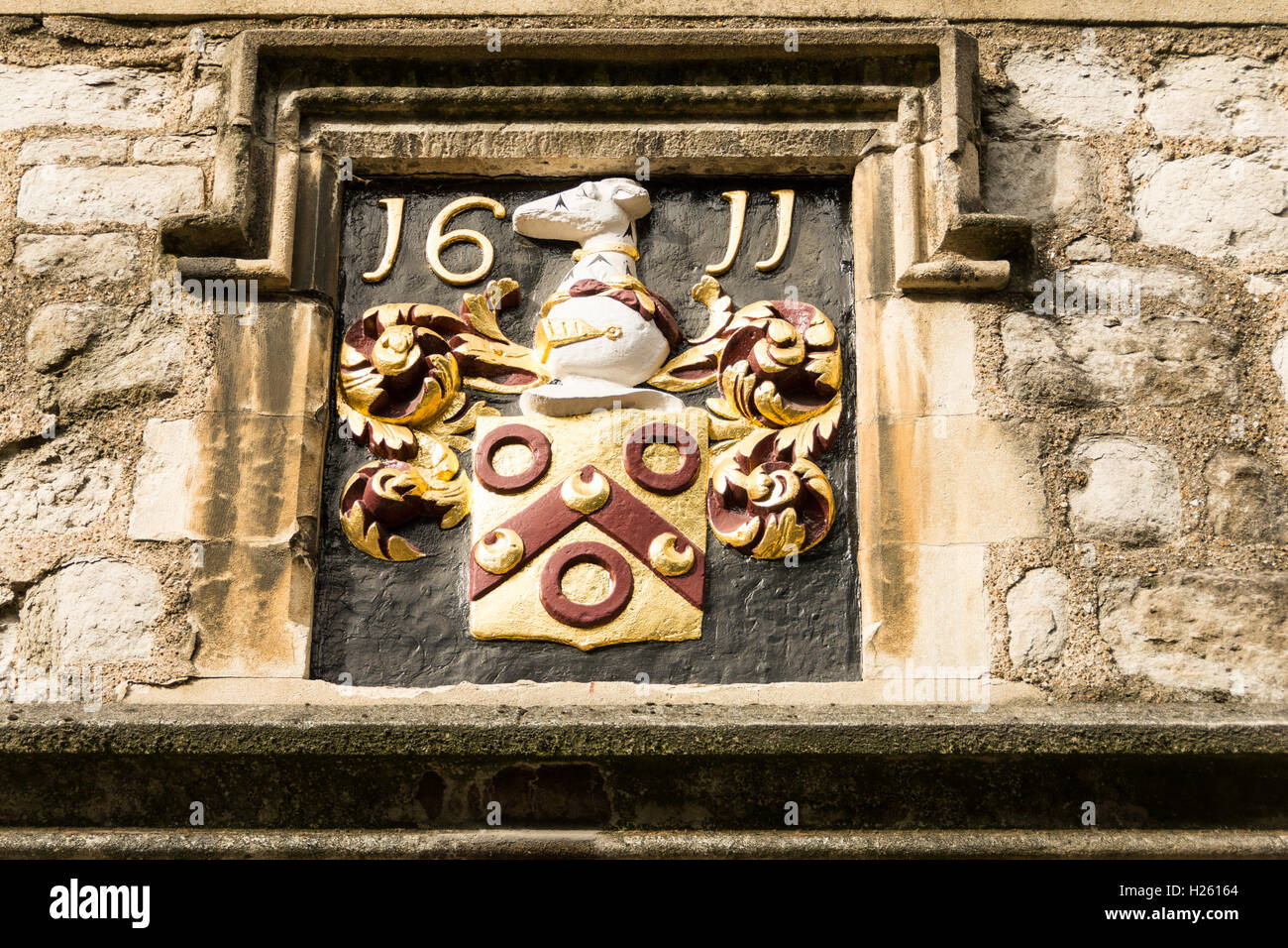 The noble Greyhound on Thomas Sutton's coat of arms outside the Charterhouse in London, EC1, UK Stock Photo