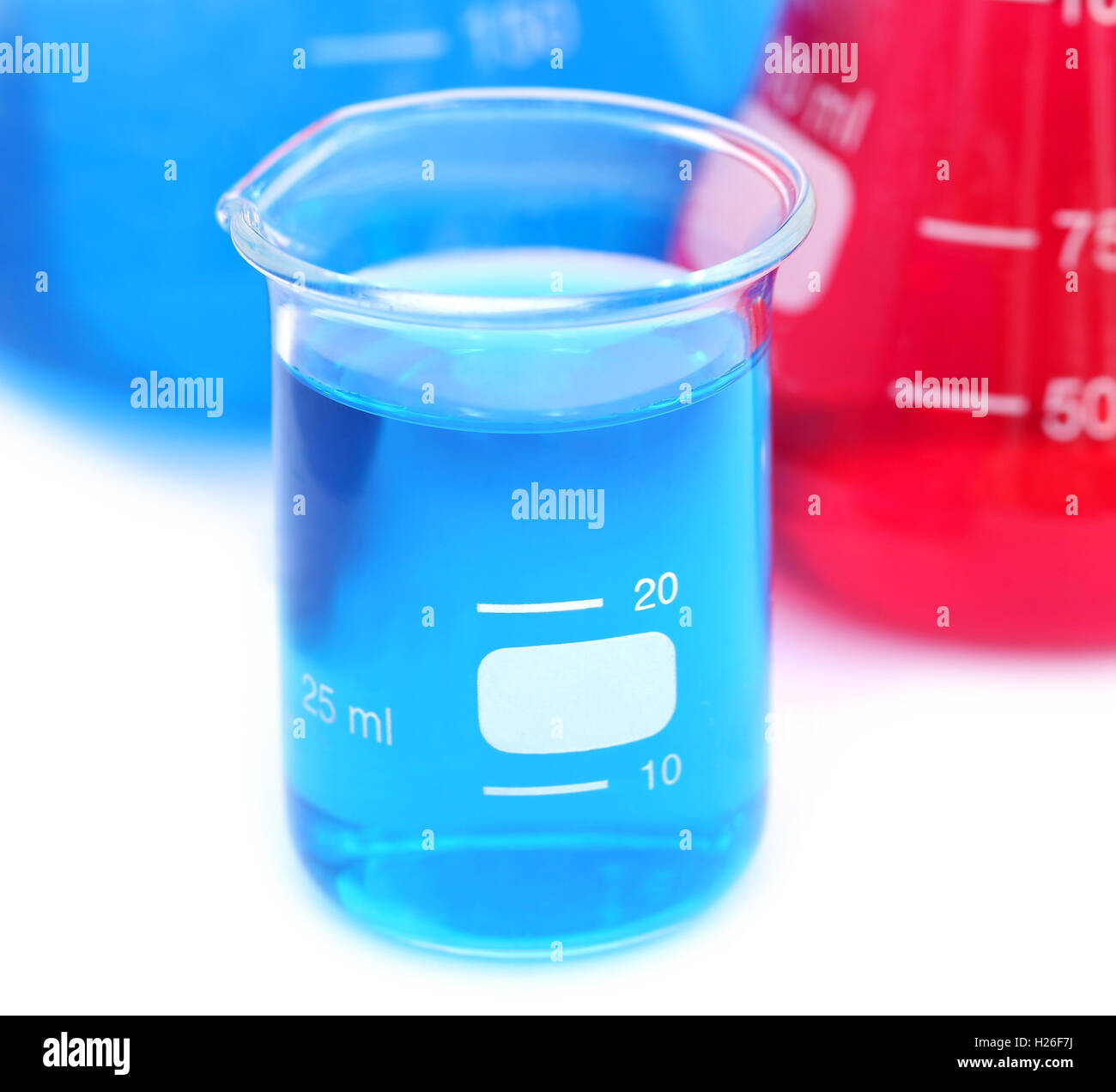 Beaker and conical flask over white background Stock Photo Alamy