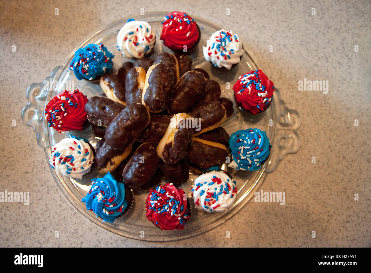 Round glass plate of candies in patriotic red, white and blue colors for independence day. St Paul Minnesota MN USA Stock Photo