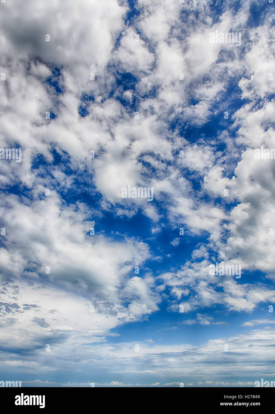 Beautiful blue sky with cumulus clouds at sunset. HDR photo Stock Photo ...