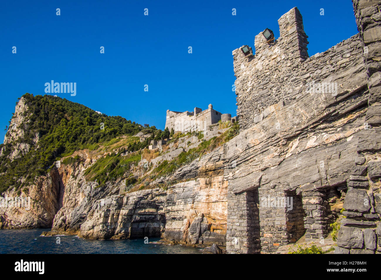 'Grotta Bryon (Arpaia)' with Castle Doria above, Portovenere, La Spezia province, Liguria, Italy. Stock Photo