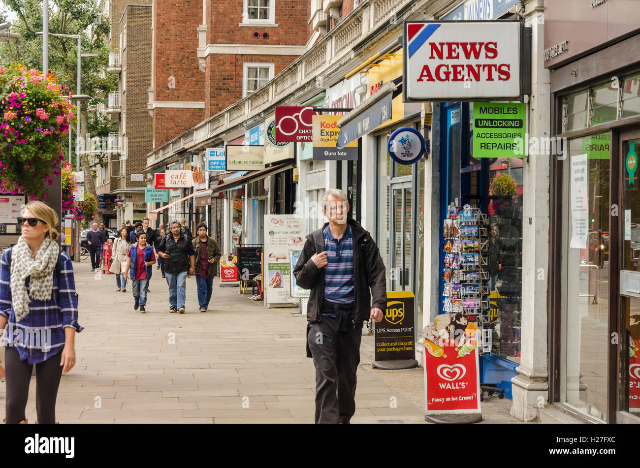Local shops on Kensington High Street Stock Photo Alamy