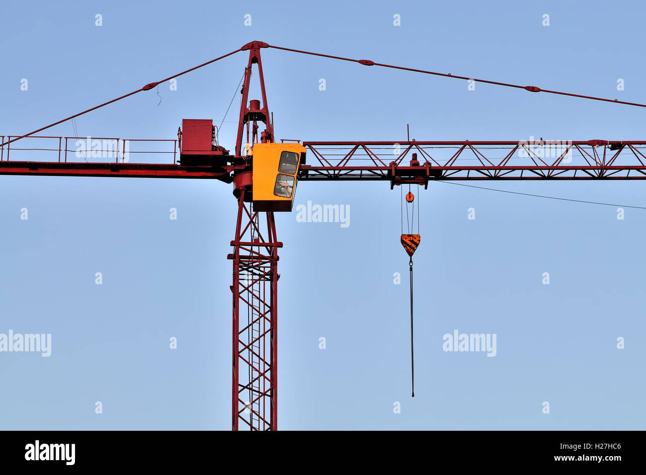 Construction crane close up on sky background Stock Photo