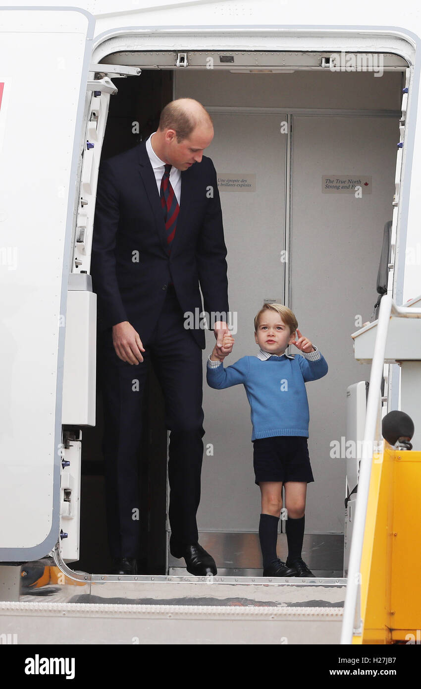 The Duke of Cambridge with his son Prince George, as they wait to exit the aircraft with his wife the Duchess of Cambridge and their daughter Princess Charlotte as they arrive at Victoria International Airport, in Victoria, Canada, on the first day of their official tour of Canada. Stock Photo