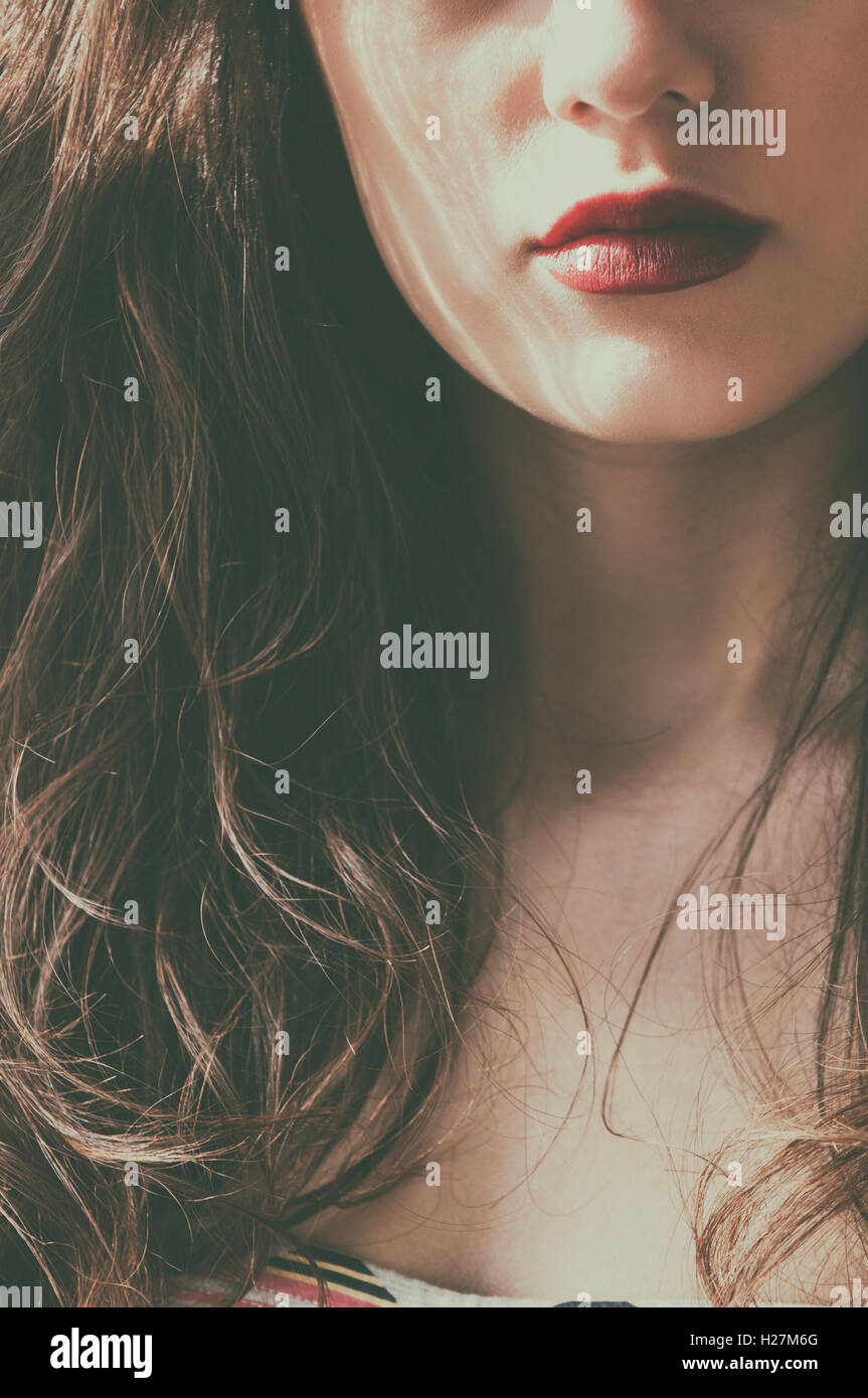 Close up of a young woman wearing red lipstick Stock Photo - Alamy