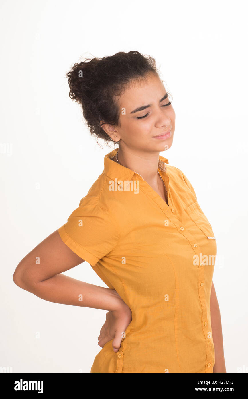 Young woman with lower back pain Stock Photo