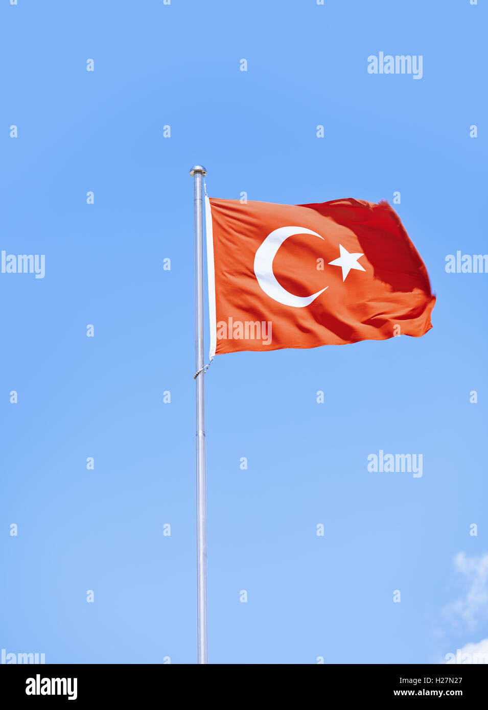 Turkish flag waving in the sky Stock Photo