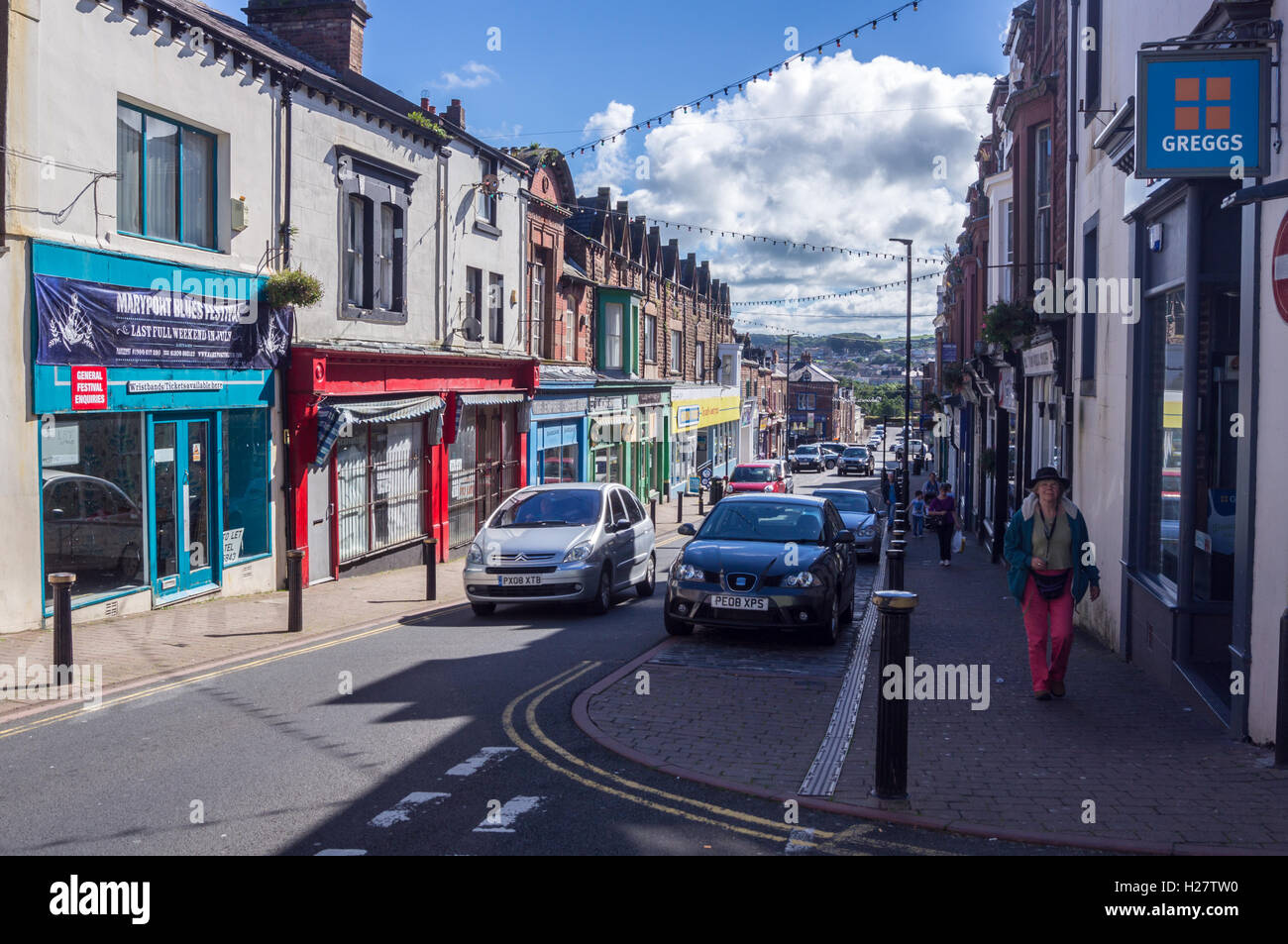 Shops in Senhouse Street, Maryport, Cumbria, England in summer Stock Photo
