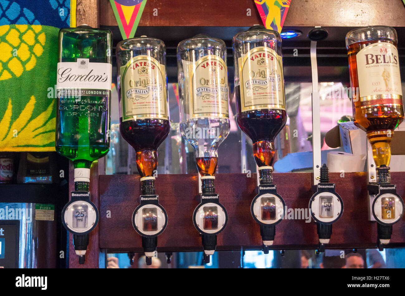 Optic drink dispensers containing Australian liqueur wine, gin and