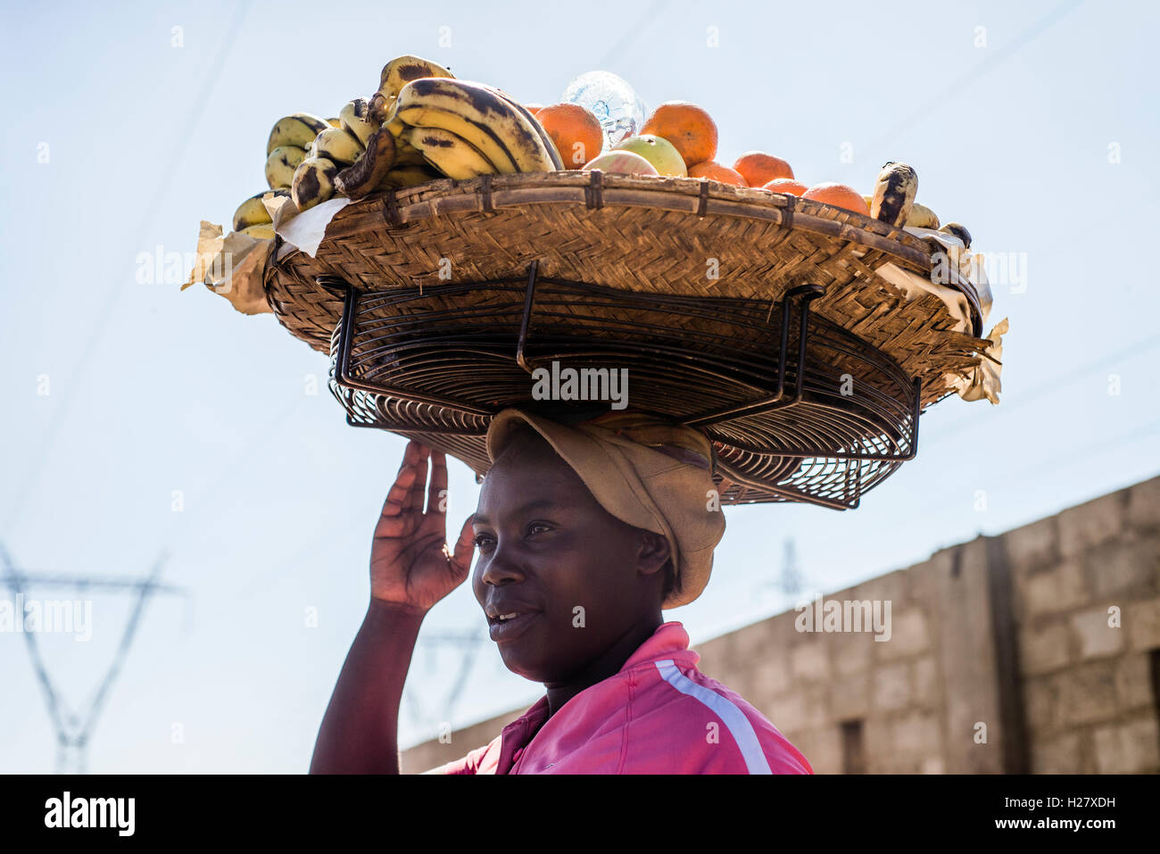 A woman sells fruits at a market in Lusaka, Zambia Stock Photo