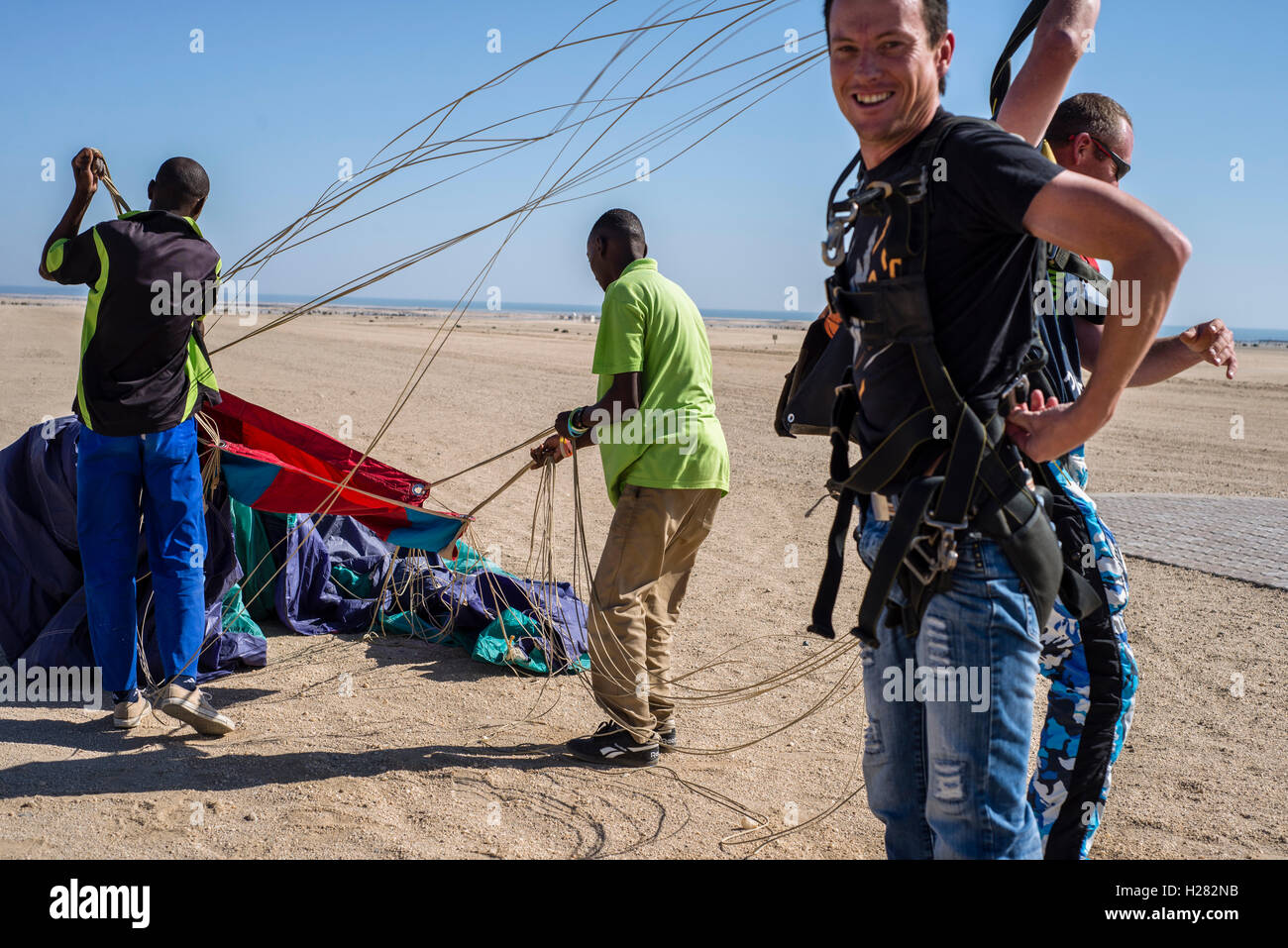 Parachute packers take away skydiving equipment from the jumping field
