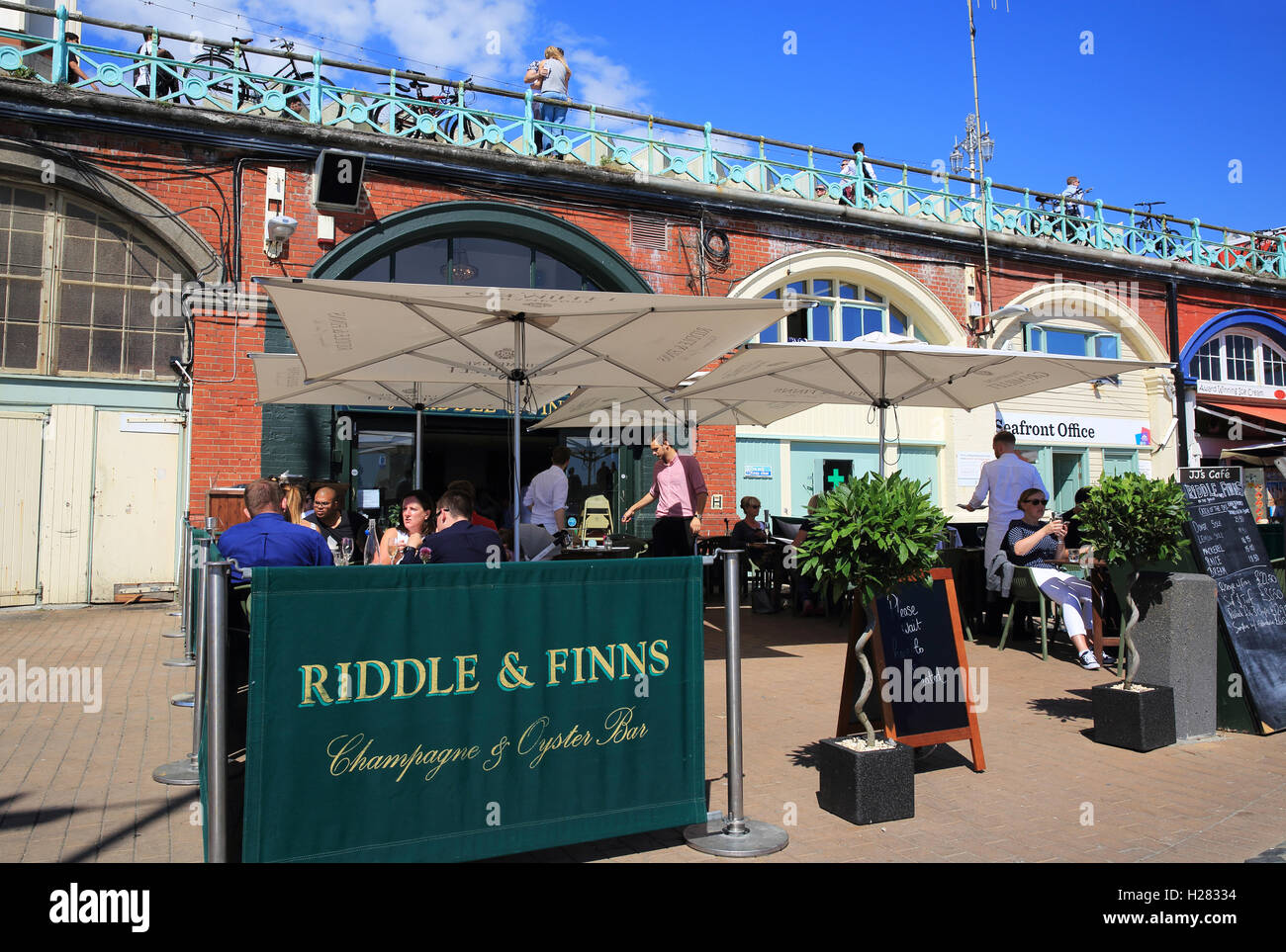 Riddle & Finns on the Beach, serving classic seafood dishes, on Brighton seafront, in East Sussex, England, UK Stock Photo