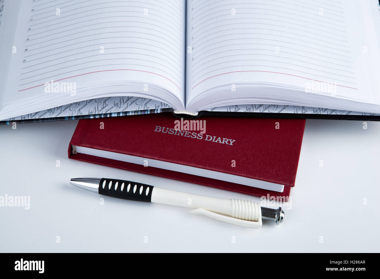 business diary with pen Stock Photo Alamy