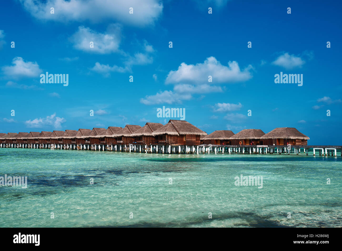 Beautiful Beach With Water Bungalows Stock Photo - Alamy