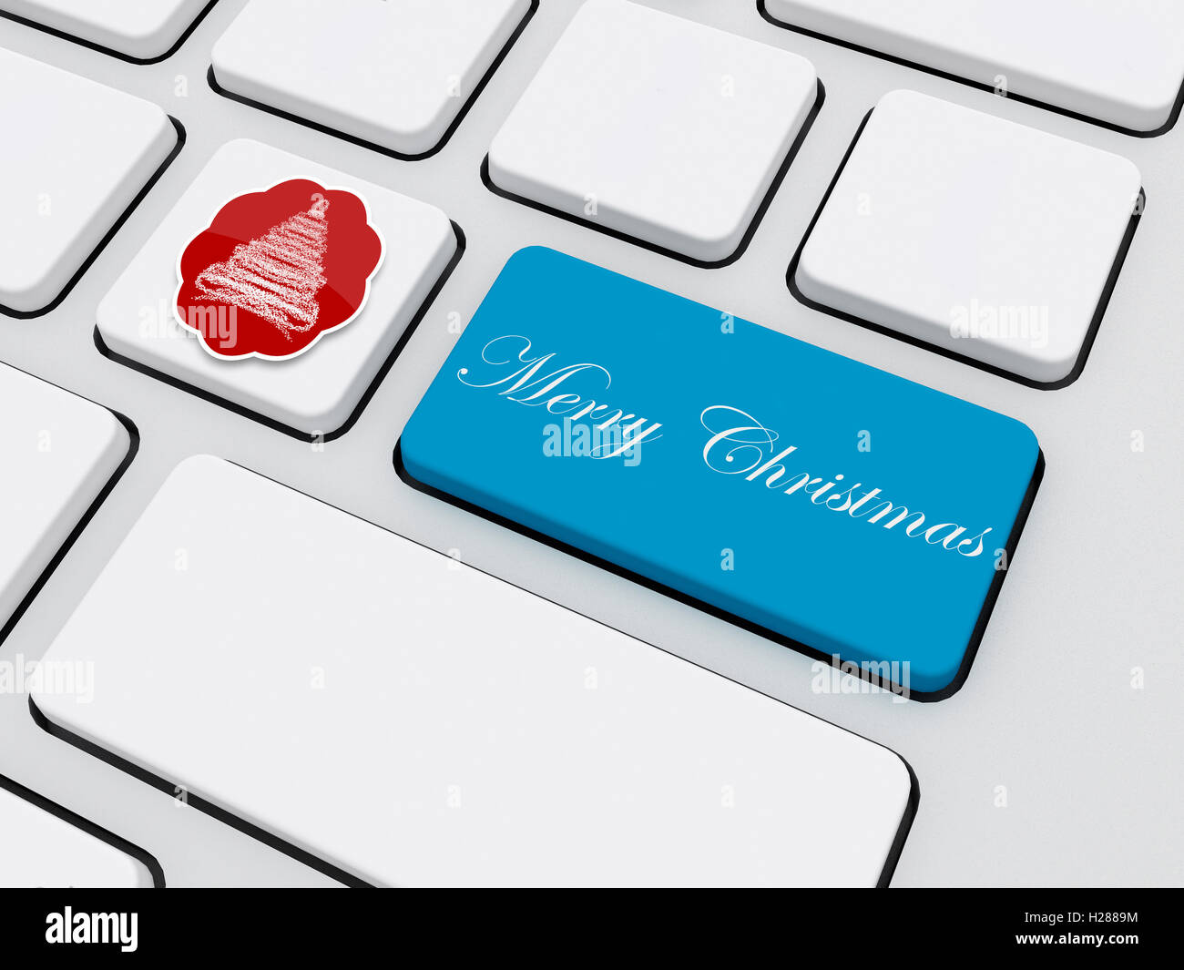 christmas tree tag with text on keyboard Stock Photo