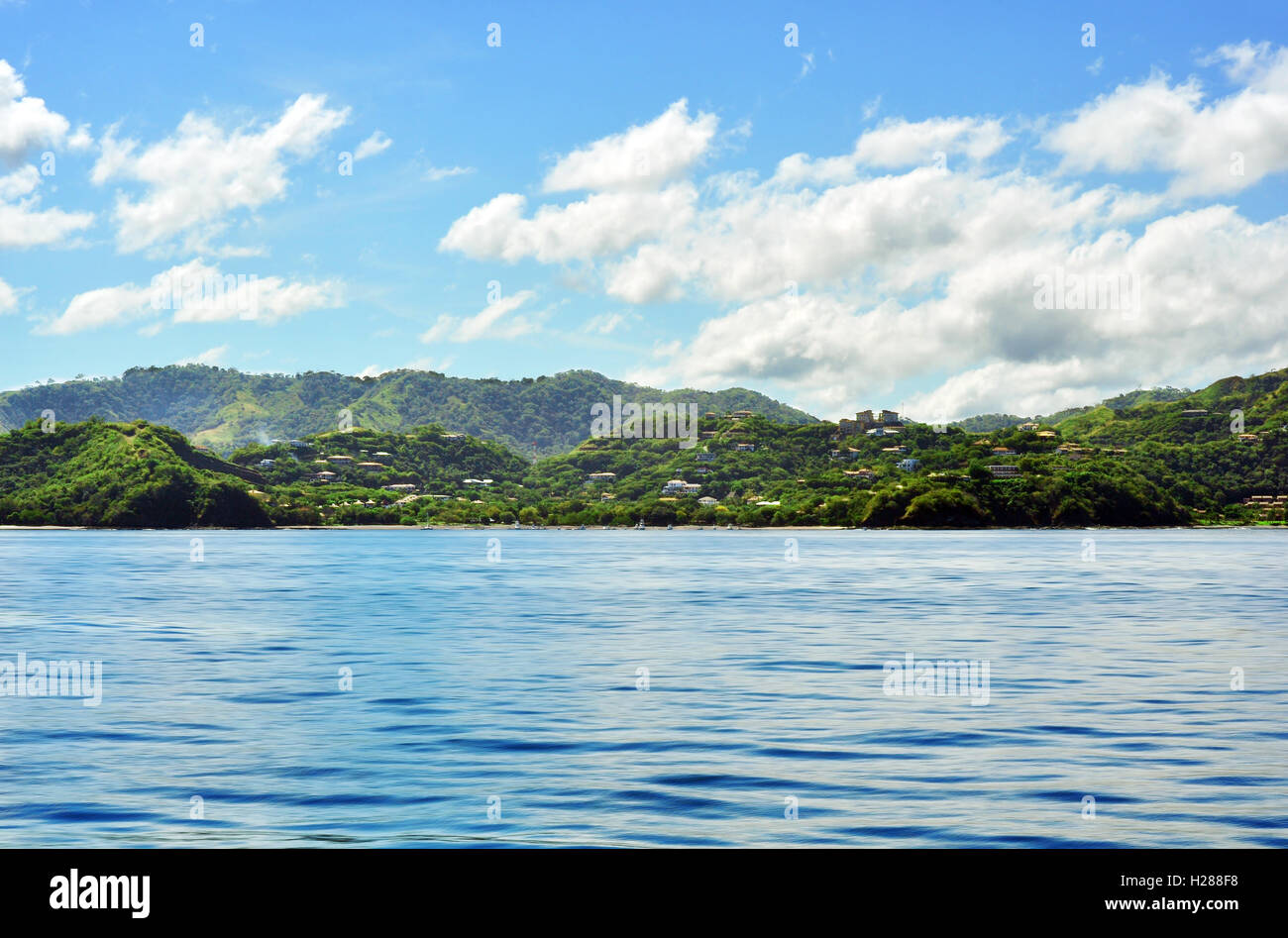 Tropical island on sunny day Stock Photo - Alamy