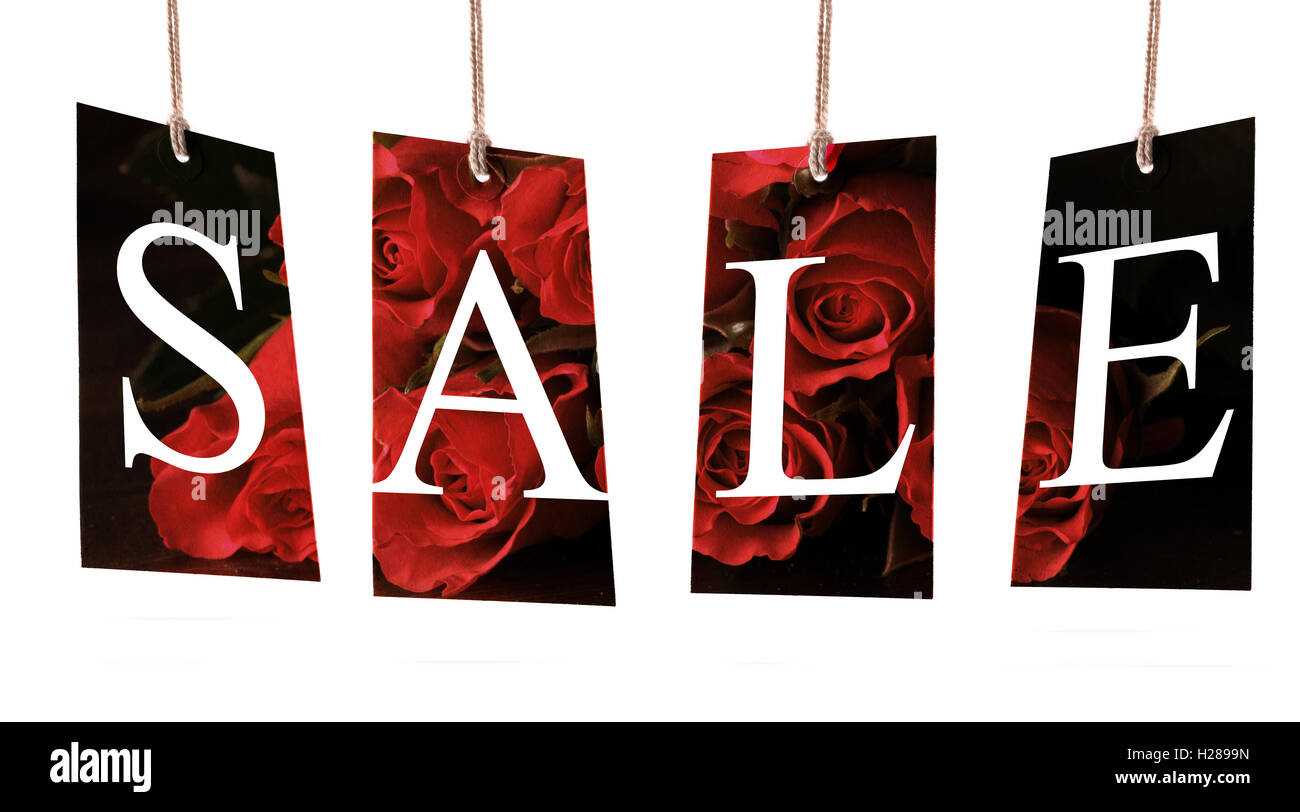 Sale labels on rose background Stock Photo - Alamy