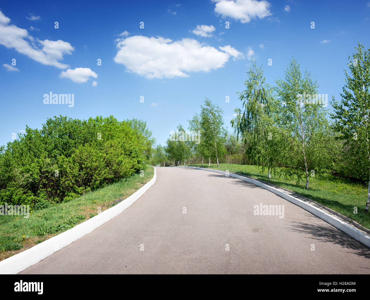 Long asphalted road hi-res stock photography and images - Alamy