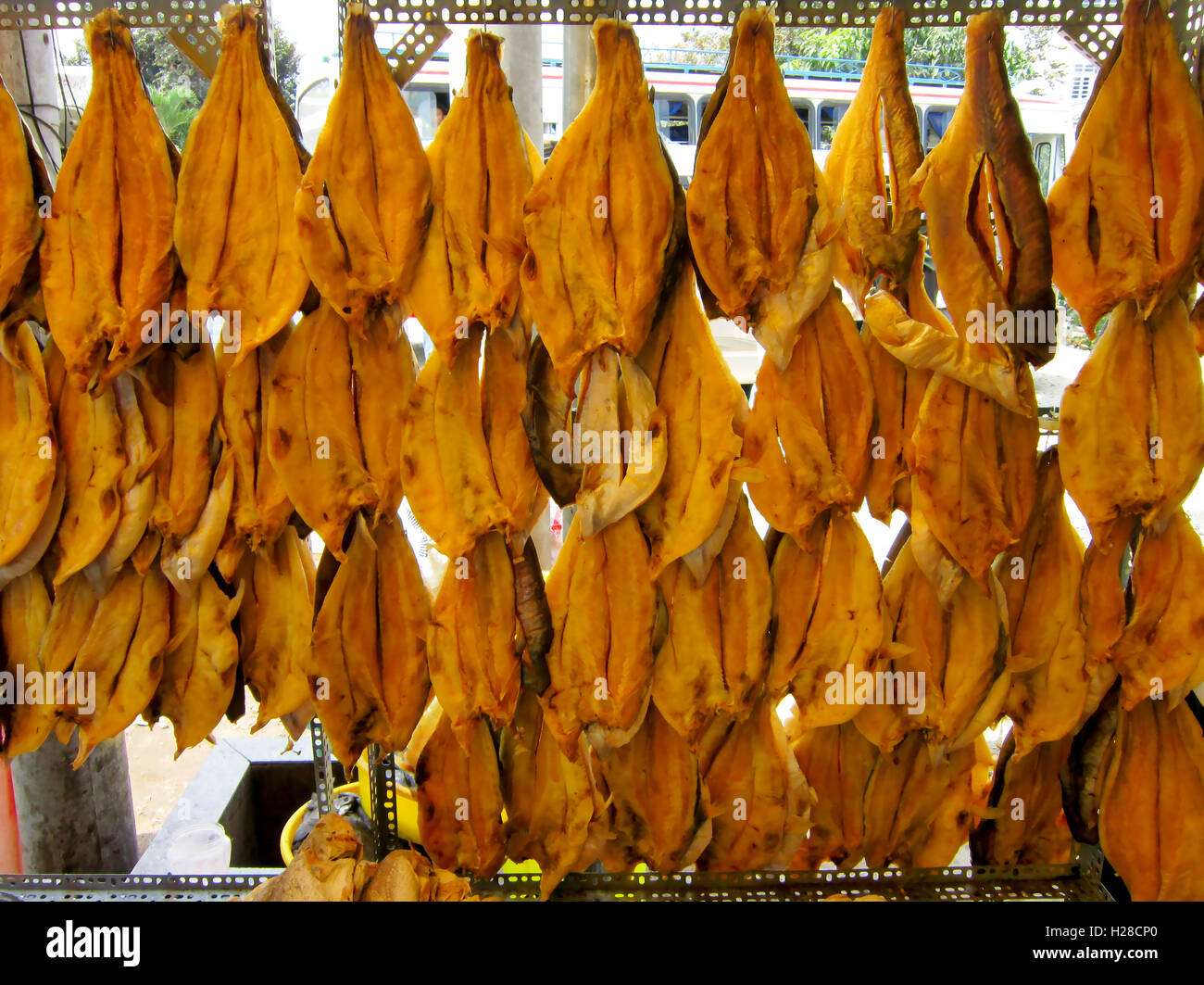 An Giang, Vietnam - July 3, 2016: Dried Vietnamese catfish or pangasius are for sale on the street Stock Photo