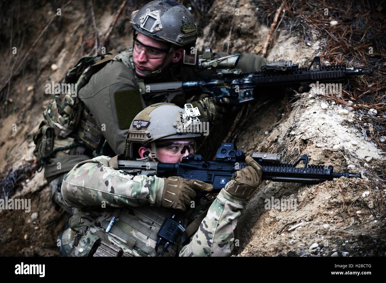 U.S. Air National Guard special operation airmen during live-fire training April 9, 2015 in Westhampton Beach, New York. Stock Photo