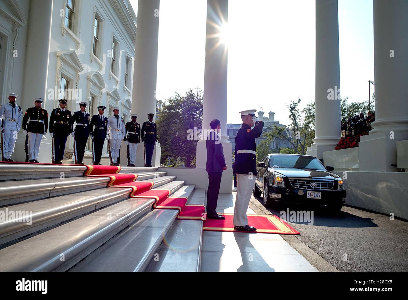 U.S. Chief of Protocol Ambassador Peter Selfridge waits to greet a leader arriving for the U.S.-Africa Leaders Summit Dinner at the North Portico of the White House August 5, 2014 in Washington, DC. Stock Photo