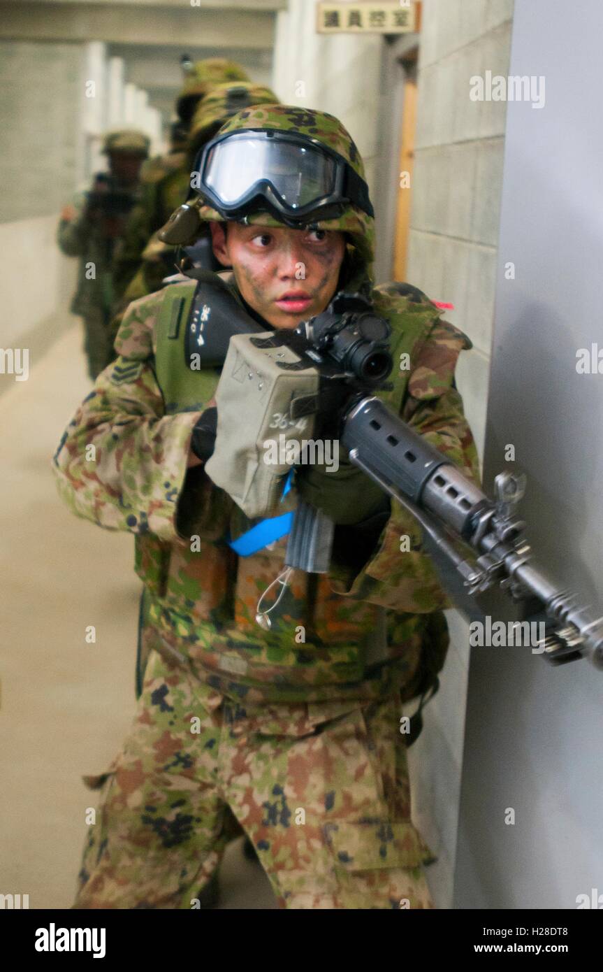 A Japanese Ground Self-Defense Force soldier during a warfare exercise at the Aibano Training Area September 18, 2016 in Shiga, Japan. Stock Photo