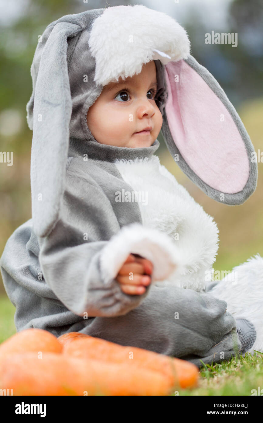 Little baby girl wearing a rabbit costume Stock Photo - Alamy