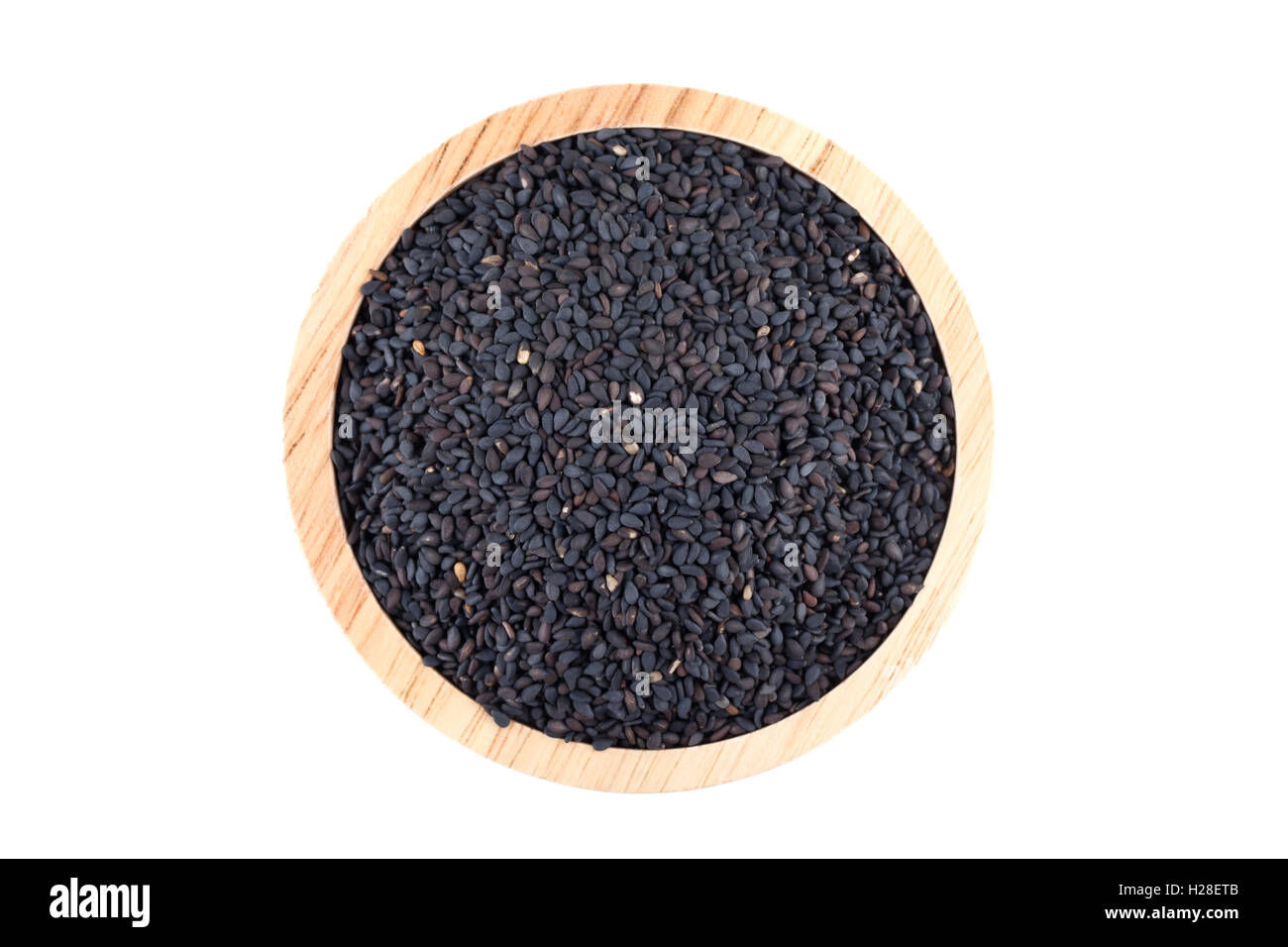 black sesame seeds in wooden bowl isolated on white background Stock ...