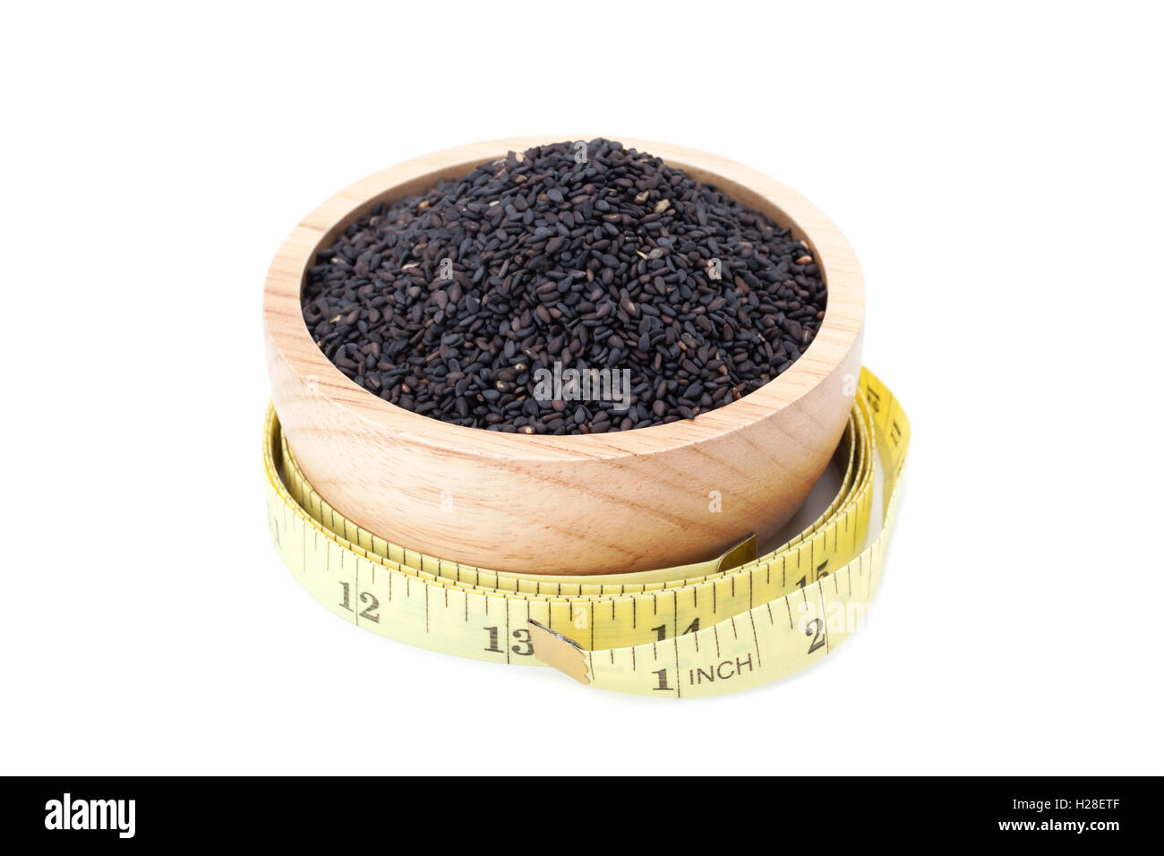 black sesame seeds in wooden bowl isolated on white background Stock ...