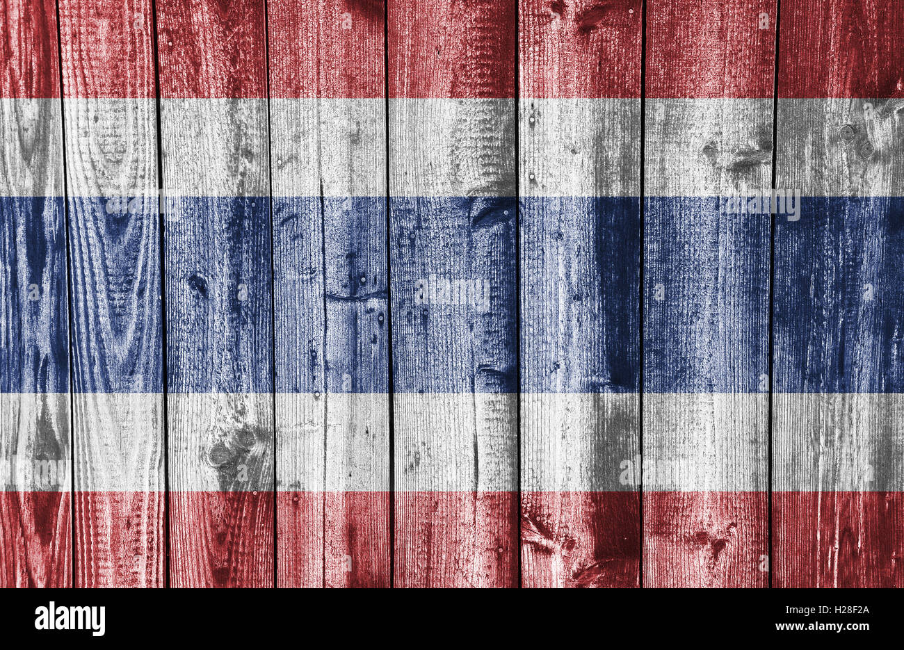 Flag on weathered wood Stock Photo - Alamy