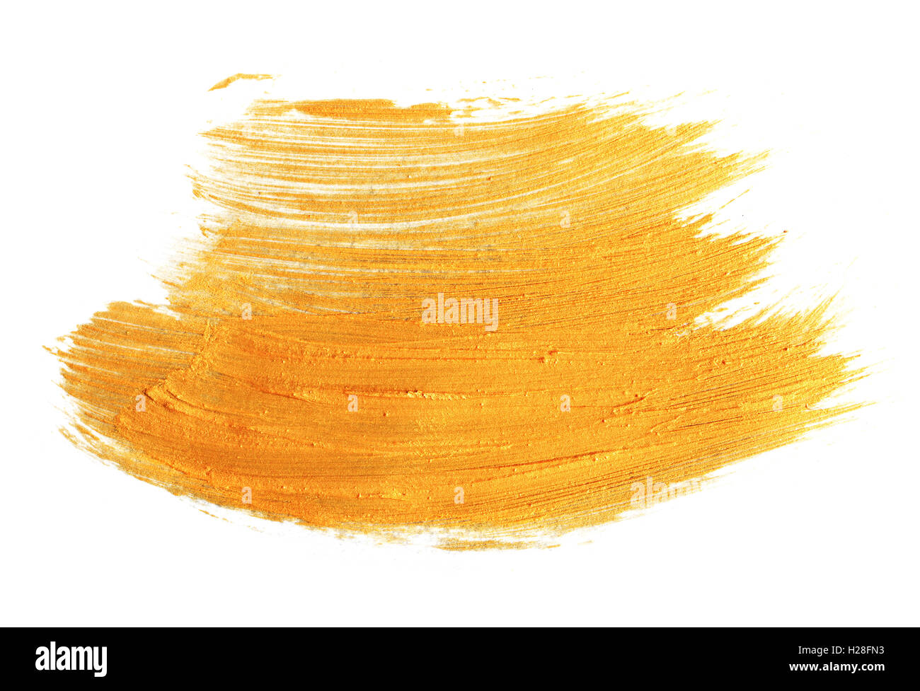 Paint brush stroke texture golden acrylic  isolated on a white background Stock Photo