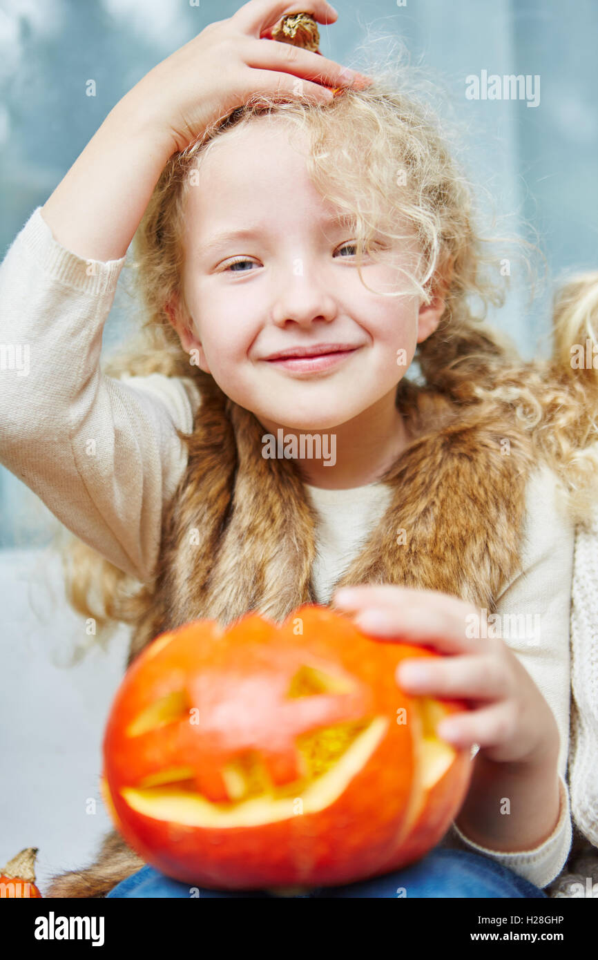 Girl pumpkin halloween hires stock photography and images Alamy