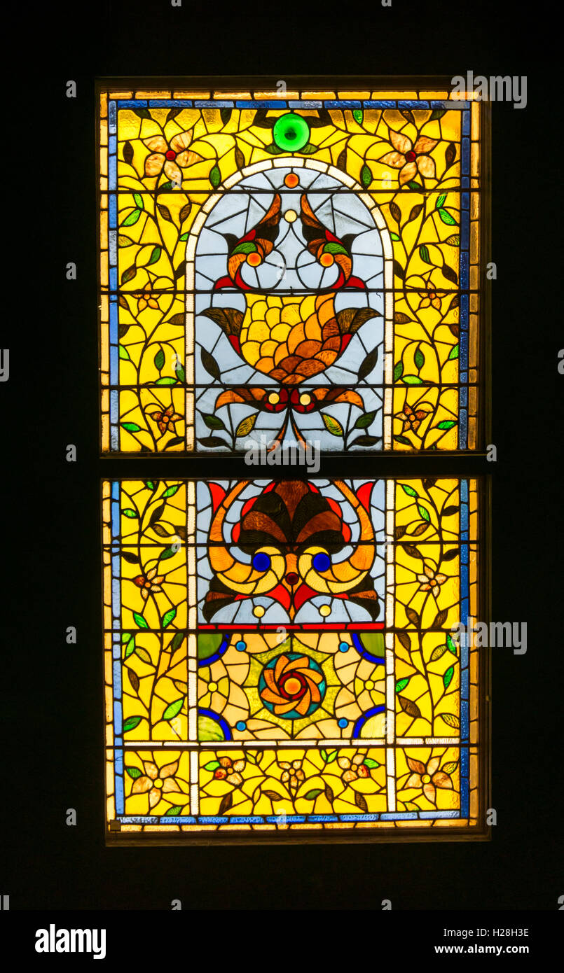 19th century American stylized floral stained glass window. Unknown designer & fabricator. From house in Hyde Park , New York. Stock Photo