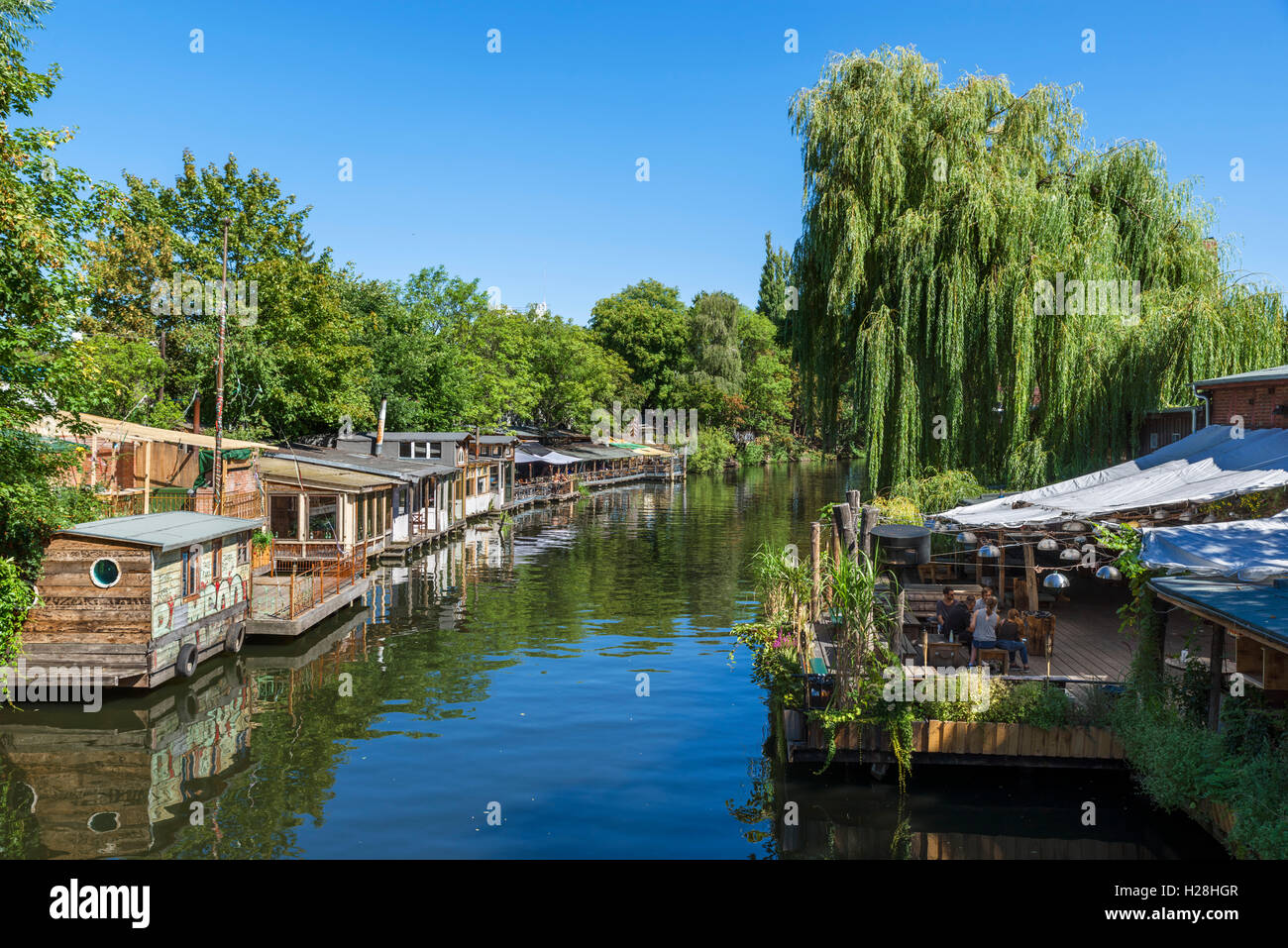 The Flutgraben Canal with  Club der Visionare to right and Freischwimmer restaurant to left, Kreuzberg, Berlin, Germany Stock Photo