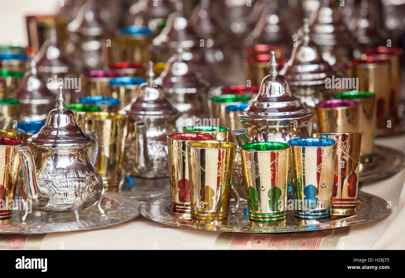 Moroccan tea sets. Glasses of colors, metal teapots and silverplated